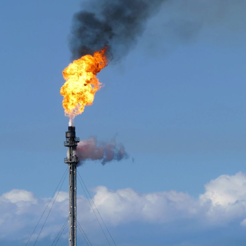 Gas flare on top of a flare stack